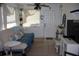 Inviting living area with comfortable seating, natural light, and tile flooring at 1006 Gray St, Plant City, FL 33563