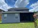 Exterior of home featuring a screened-in lanai at 10109 36Th E Ct, Parrish, FL 34219