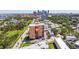 Aerial shot showcasing the building with city views surrounded by mature landscaping at 1120 N Shore Ne Dr # 503, St Petersburg, FL 33701