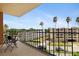 Balcony view of the city with metal railing and cozy seating at 1120 N Shore Ne Dr # 503, St Petersburg, FL 33701