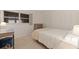 Bright bedroom features a bed, desk, and ample closet space, offering comfort and functionality at 1120 N Shore Ne Dr # 503, St Petersburg, FL 33701