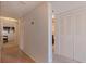 Neutral hallway with carpet leads to various rooms, showcasing clean lines and functional design at 1120 N Shore Ne Dr # 503, St Petersburg, FL 33701