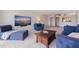 Spacious living room with comfortable blue furniture at 1120 N Shore Ne Dr # 503, St Petersburg, FL 33701