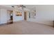Open-concept living room with views to the kitchen and decorative mirrors at 1120 N Shore Ne Dr # 503, St Petersburg, FL 33701
