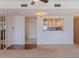 Cozy living room features an open layout with a view of the well-equipped kitchen at 1120 N Shore Ne Dr # 503, St Petersburg, FL 33701