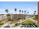 Scenic view overlooking street and Gulf beaches from the balcony at 1120 N Shore Ne Dr # 503, St Petersburg, FL 33701