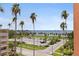 Scenic water view with palm trees from the condo building at 1120 N Shore Ne Dr # 503, St Petersburg, FL 33701
