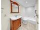 Bathroom with vanity, tile floor, toilet and shower at 11460 Park Blvd, Seminole, FL 33772