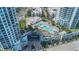 Aerial view of the upscale condominiums with luxurious pools and lush landscaping at 1209 E Cumberland Ave # 2703, Tampa, FL 33602