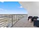 Condo featuring spacious balcony with outdoor seating to enjoy city and water views at 1209 E Cumberland Ave # 2703, Tampa, FL 33602