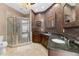 Beautiful bathroom featuring dual sinks, a luxurious shower and designer tile at 1209 E Cumberland Ave # 2703, Tampa, FL 33602