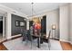 Elegant dining room with hardwood floors, modern art, and a contemporary chandelier at 1209 E Cumberland Ave # 2703, Tampa, FL 33602