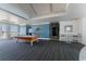 Condominium game room featuring a pool table, seating area, and scenic views from the large windows at 1209 E Cumberland Ave # 2703, Tampa, FL 33602