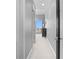 A grey hallway with a balcony view at 1209 E Cumberland Ave # 2703, Tampa, FL 33602
