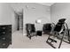 A gray living room with chairs and exercise equipment at 1209 E Cumberland Ave # 2703, Tampa, FL 33602