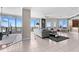 Bright and spacious living room with floor-to-ceiling windows and tile flooring at 1209 E Cumberland Ave # 2703, Tampa, FL 33602