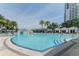 Beautiful curved pool and palm trees create a relaxed atmosphere at the luxury condominium complex at 1209 E Cumberland Ave # 2703, Tampa, FL 33602