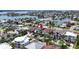 Gorgeous waterfront home featuring a lush backyard, pristine pool, and easy access to the bay and ocean at 131 Forest Hills Dr, Redington Shores, FL 33708