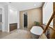 Elegant bathroom featuring a soaking tub, unique tiling, and a wooden ladder rack at 131 Forest Hills Dr, Redington Shores, FL 33708