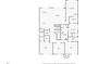 Detailed floor plan showcasing the upper-level layout of a home including the kitchen, living room, and bedrooms at 131 Forest Hills Dr, Redington Shores, FL 33708