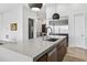 Bright kitchen island featuring modern appliances, sleek countertops, and stylish lighting fixtures at 131 Forest Hills Dr, Redington Shores, FL 33708