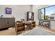 Bright office space with large window, desk, and stylish decor at 131 Forest Hills Dr, Redington Shores, FL 33708