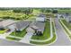 Aerial shot of a modern home with a well-maintained lawn in a suburban neighborhood at 13304 Mylion Way, Spring Hill, FL 34610