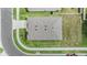 Top-down aerial view of home showing roof, landscaping, and surrounding neighborhood streets at 13304 Mylion Way, Spring Hill, FL 34610