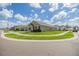 Curb view of single-Gathering home, featuring manicured lawn and attractive landscaping in a serene neighborhood at 13304 Mylion Way, Spring Hill, FL 34610