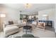 Stylish living room showcasing modern decor, neutral tones, and an open floor plan at 13304 Mylion Way, Spring Hill, FL 34610