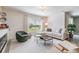 Inviting living room with fireplace, stylish furniture, and natural light at 13304 Mylion Way, Spring Hill, FL 34610