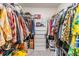 Large walk-in closet with wire shelving and a built-in chest of drawers at 13304 Mylion Way, Spring Hill, FL 34610