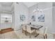 Elegant dining area featuring neutral paint, chandelier, and stylish table setting for intimate dining experiences at 134 Barrington Dr, Brandon, FL 33511