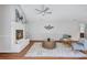 Open-concept living room with modern fireplace and bright natural light at 134 Barrington Dr, Brandon, FL 33511