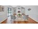 Living room features bright natural light and access to outdoor patio at 134 Barrington Dr, Brandon, FL 33511