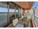 Balcony view with comfortable seating offering expansive ocean views at 1340 Gulf Blvd # 8C, Clearwater Beach, FL 33767