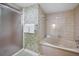 Bathroom featuring a combination bathtub and shower at 1340 Gulf Blvd # 8C, Clearwater Beach, FL 33767