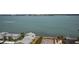 Exterior view of condos showcasing a waterfront view and private beach access and parking for residents at 1340 Gulf Blvd # 8C, Clearwater Beach, FL 33767