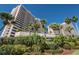 Extensive landscaping surrounds the front of this modern oceanfront condo at 1340 Gulf Blvd # 8C, Clearwater Beach, FL 33767