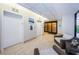 Lobby with elevators, seating and tile flooring, providing a welcoming entrance for residents and visitors at 1340 Gulf Blvd # 8C, Clearwater Beach, FL 33767