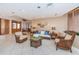 Well-lit lobby featuring wicker furniture, tiled floors, and elegant decor at 1340 Gulf Blvd # 8C, Clearwater Beach, FL 33767