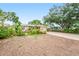 Quaint single-story home with a simple landscape and a brick-paved driveway at 1517 60Th S St, Gulfport, FL 33707