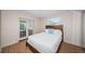 Bedroom with french doors to patio and lots of natural light at 1700 Shore Acres Ne Blvd, St Petersburg, FL 33703