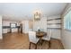 Open concept dining and kitchen area with modern finishes and updated appliances at 1700 Shore Acres Ne Blvd, St Petersburg, FL 33703