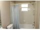 Clean bathroom with a shower-tub combination and standard fixtures at 208 Wilson Ave, Brooksville, FL 34601