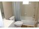 Functional bathroom with shower-tub, updated fixtures, and ample space at 208 Wilson Ave, Brooksville, FL 34601