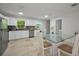 Open floor plan with kitchen and dining area adjacent and natural lighting at 2121 Dodge St, Clearwater, FL 33760