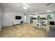 Spacious living room adjacent to the dining and kitchen area at 2121 Dodge St, Clearwater, FL 33760