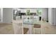 Well-lit kitchen and dining area featuring modern appliances and plenty of countertop space at 2121 Dodge St, Clearwater, FL 33760