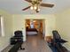 Versatile bonus room providing a view into the main bedroom at 2210 Bayou Dr, Holiday, FL 34691